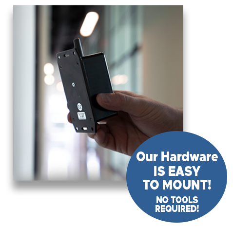 Image of High Level Wireless Panic Button being placed on a wall. Our Hardware Is Easy To Mount. No Tools Required.