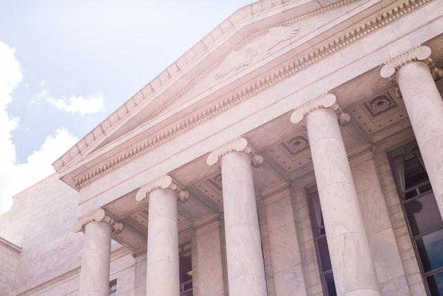 Exterior view of a government building with columns