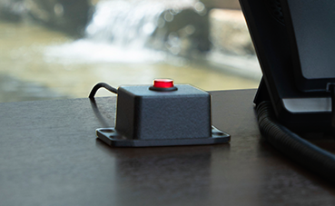 image of Silent Panic Button hardware sittin on a desk