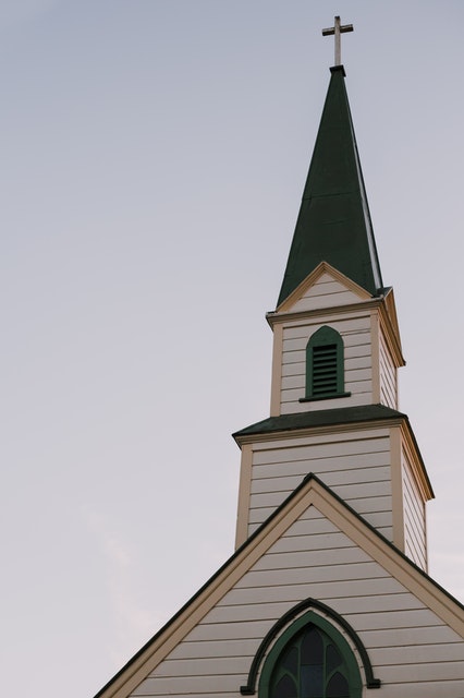 Exterior view of a church with a steeple